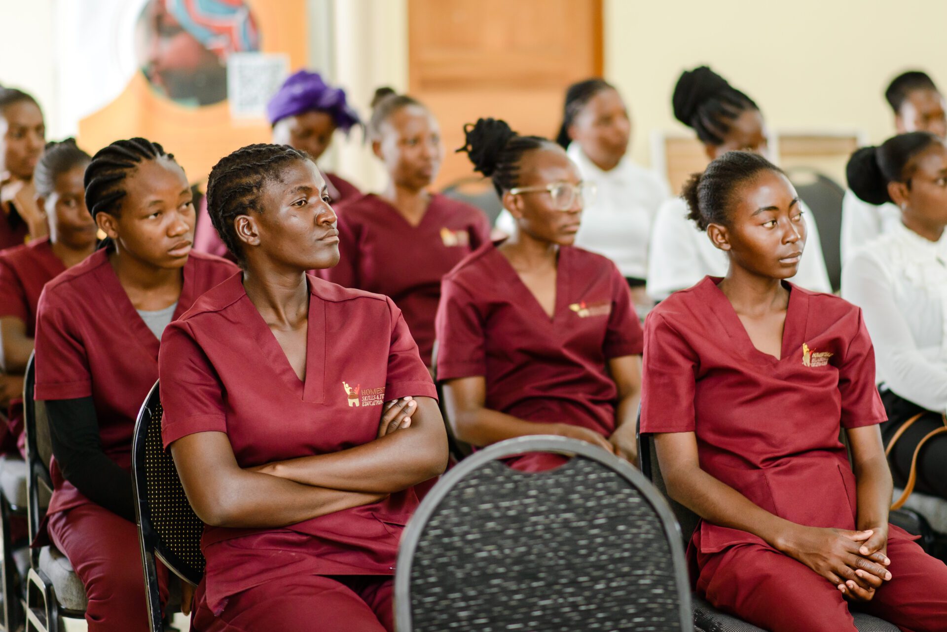 a group of nurses sitting in chairs