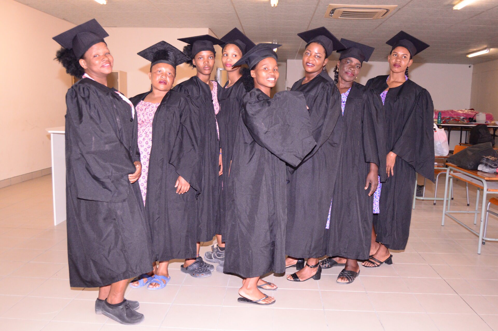 a group of women in graduation gowns