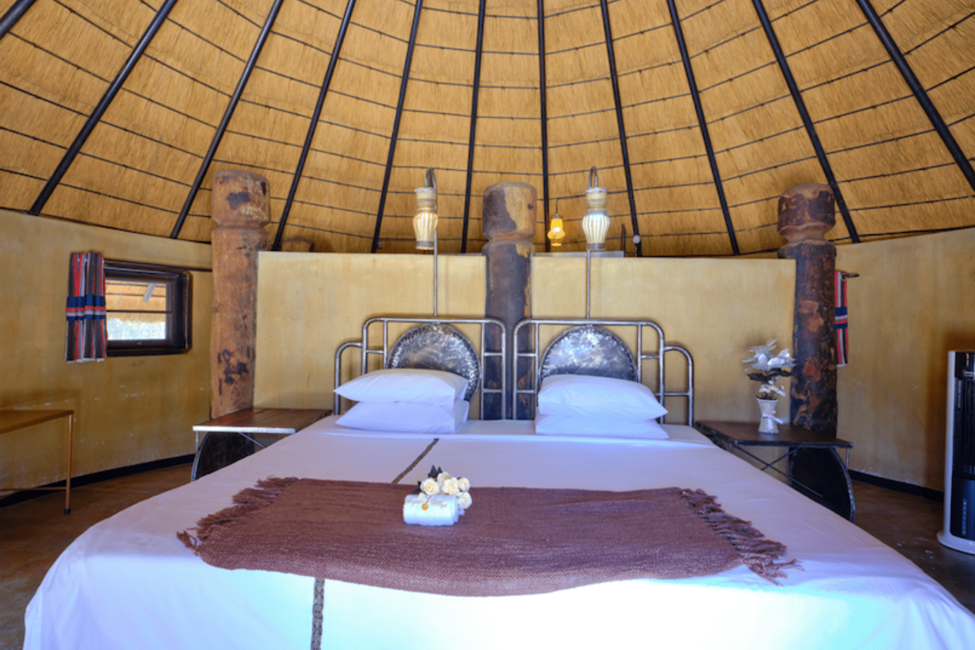 a bed in a room with a dome